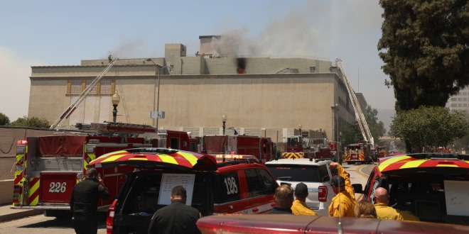 Fire in historic Harris Building challenges crews aimed at suppression